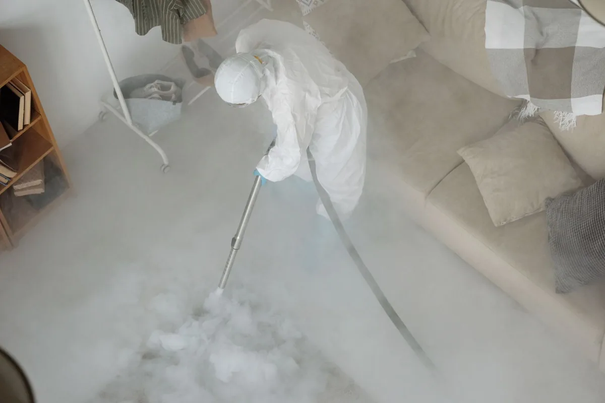Biohazard cleanup technician in protective equipment, Edgemont Park, MI